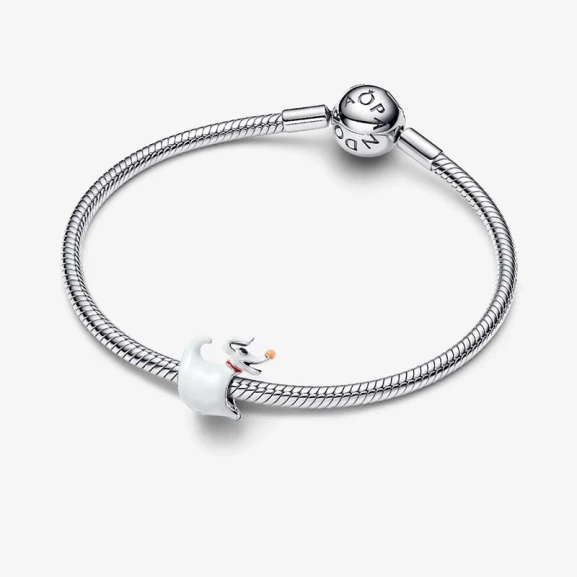 tillverkad i sterlingsilver och självlysande emalj