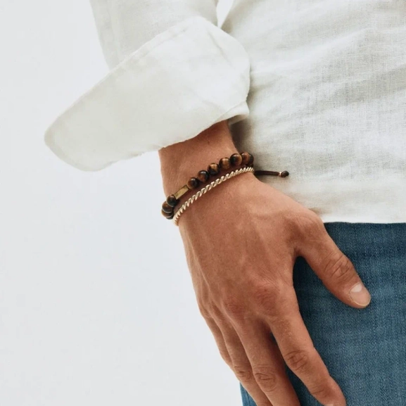 Edblads herrarmband Luke i gul tigeröga och rostfritt stål med 14K guldplätering