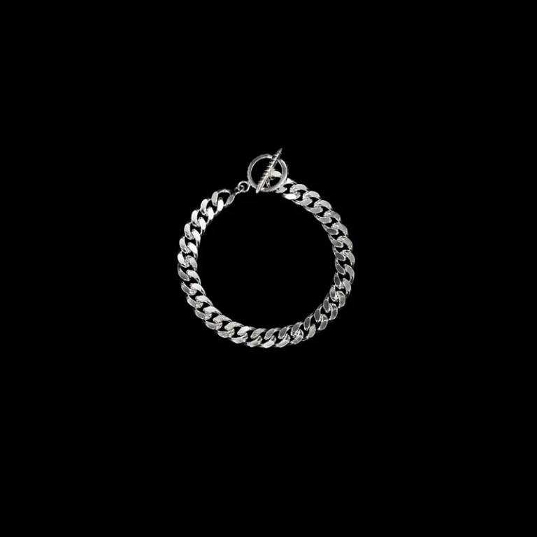 Claw Faceted Bracelet i silver med 9 mm bredd och klolåsning från Maria Nilsdotter