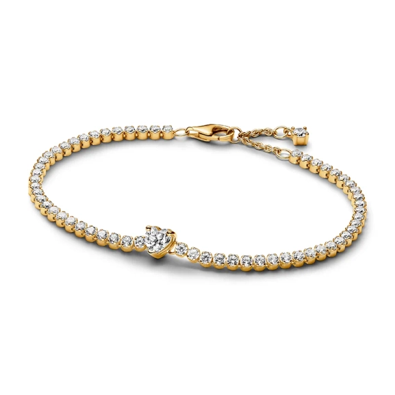Sparkling Heart Tennis-Armband aus Gold mit einem herzförmigen Stein in der Mitte und 58 verblassten Steinen um das Handgelenk. Ein Symbol für Liebe und Schönheit